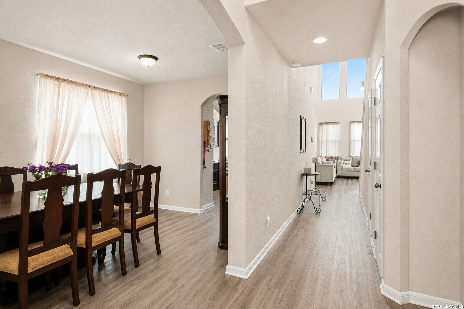 213 Wildcat Cibolo, TX 78108 - Photo 4 of 34 a view of a a dining room with furniture window and wooden floor