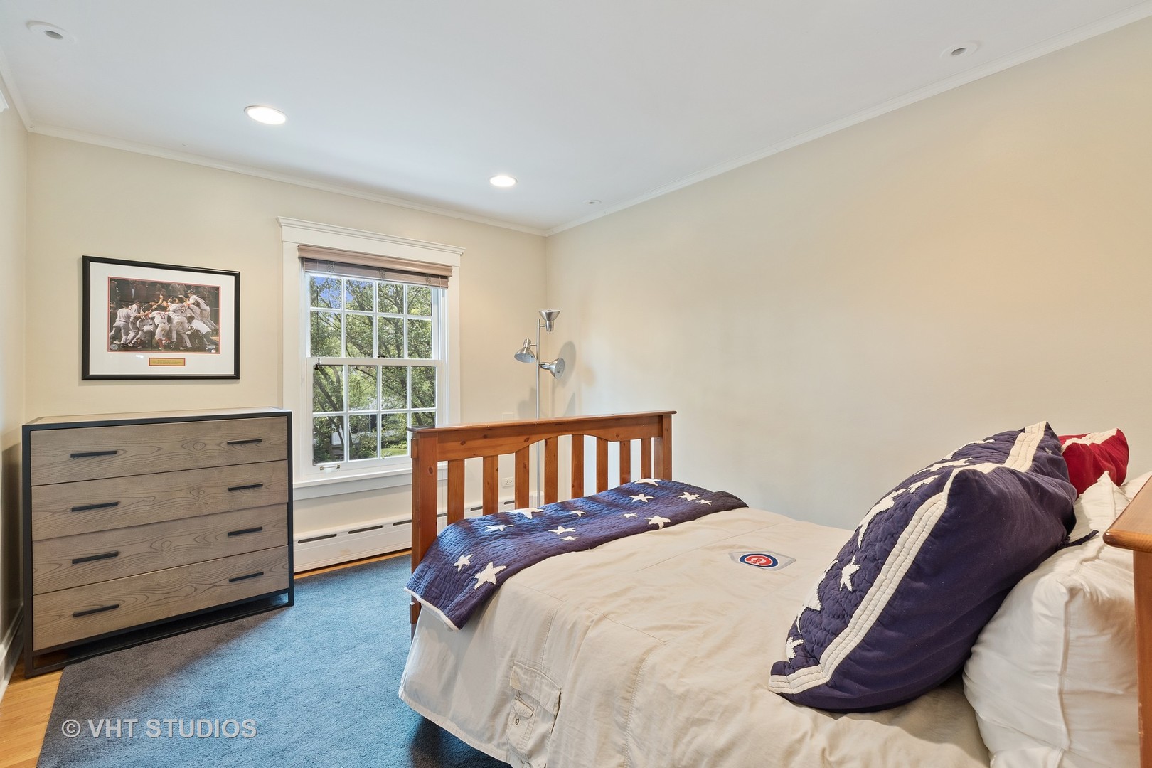 811 Sunset Road Winnetka, IL 60093 - Photo 22 of 40 a bedroom with a bed and a window