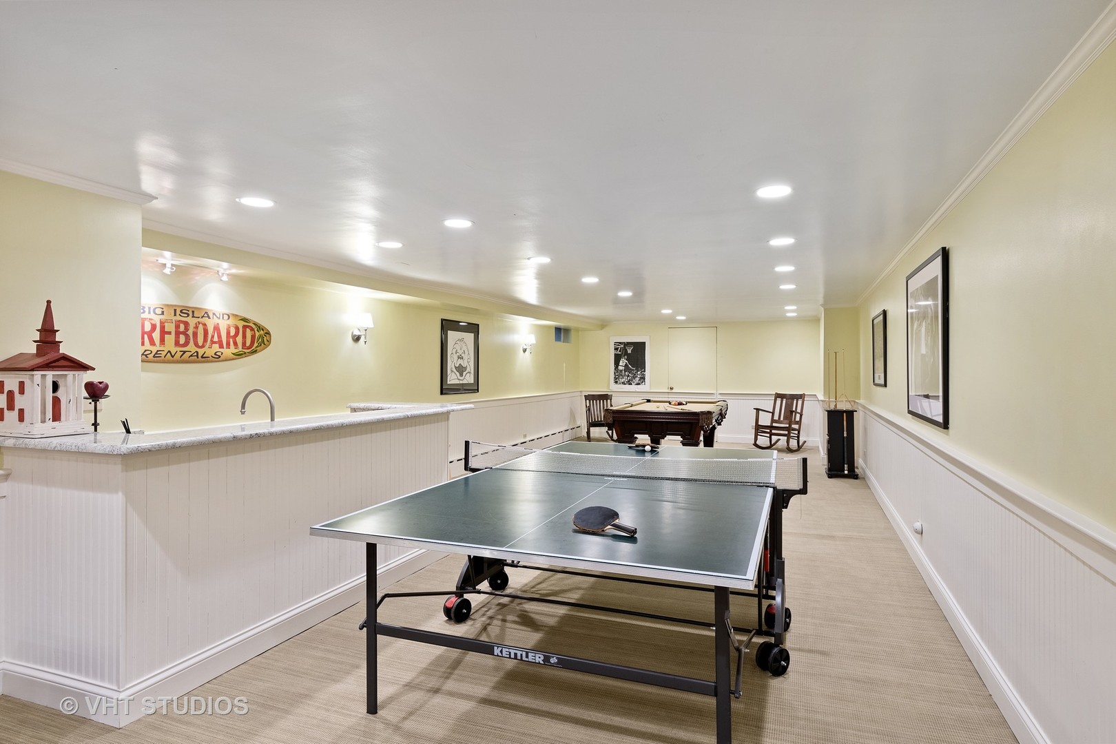 811 Sunset Road Winnetka, IL 60093 - Photo 26 of 40 a room with kitchen island a table and chairs