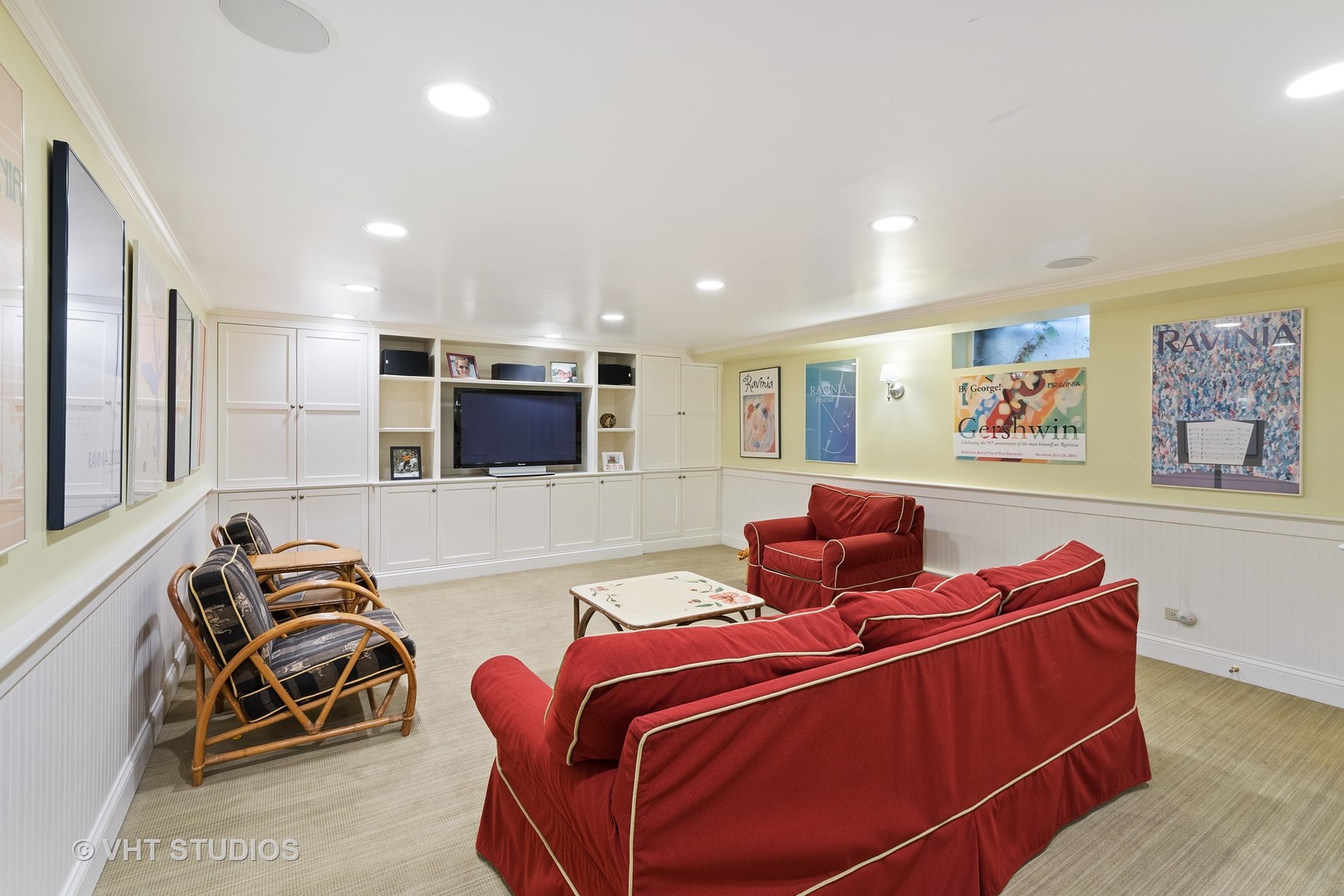 811 Sunset Road Winnetka, IL 60093 - Photo 27 of 40 a living room with furniture a flat screen tv and a couch