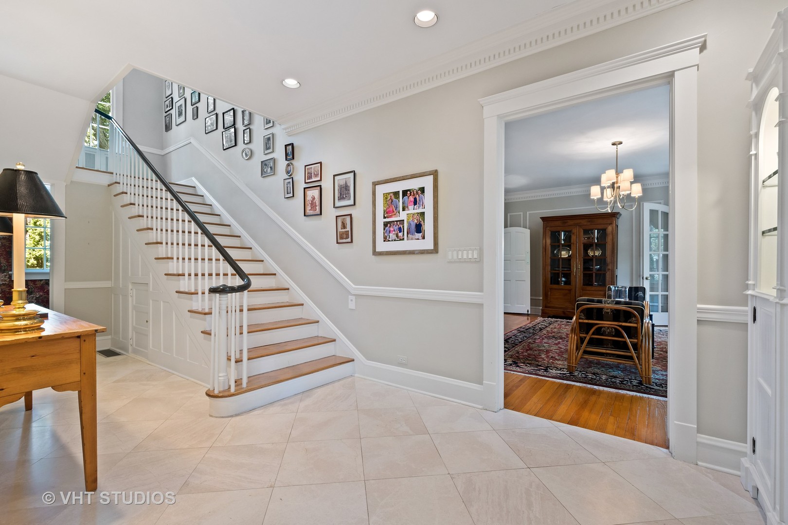 811 Sunset Road Winnetka, IL 60093 - Photo 4 of 40 a view of front door with hallway and stairs