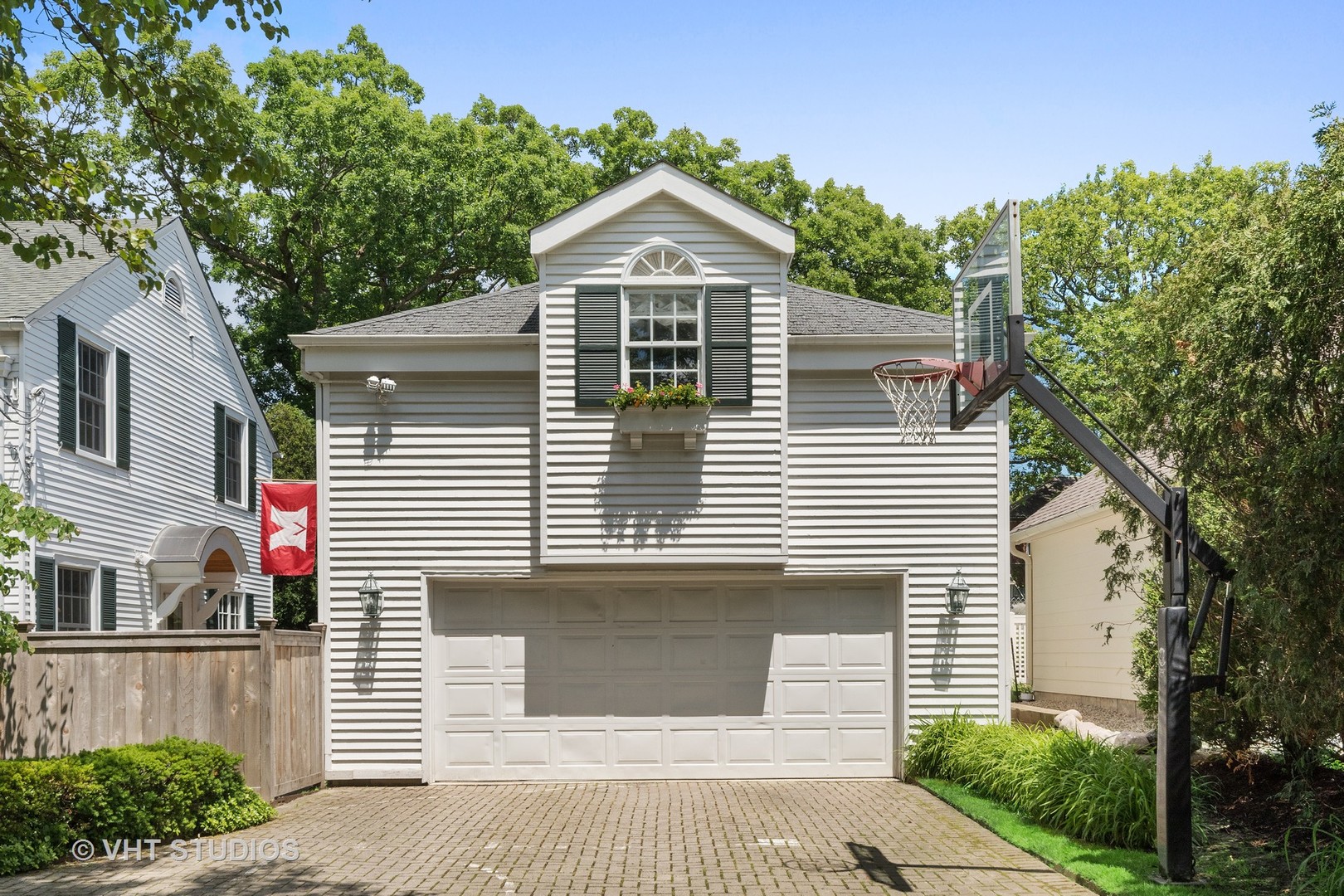 811 Sunset Road Winnetka, IL 60093 - Photo 34 of 40 a front view of a house with a yard