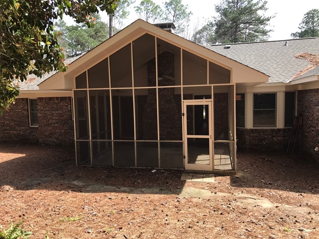 7101 Widgeon Drive Midland, GA 31820 - Photo 7 of 7 a view of a house with a yard