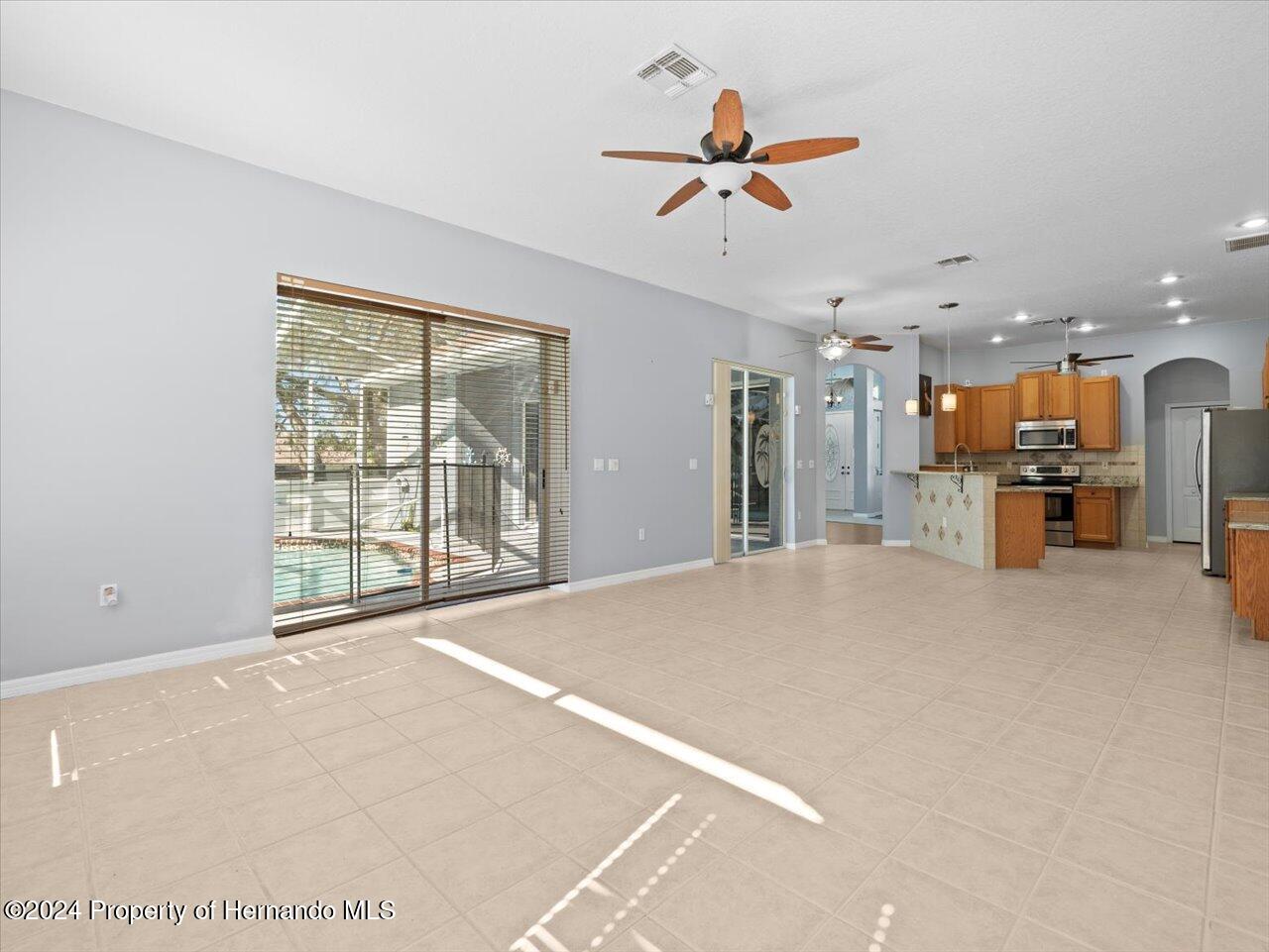 10307 Ridge Top Loop Spring Hill, FL 34613 - Photo 22 of 50 22-Family Room