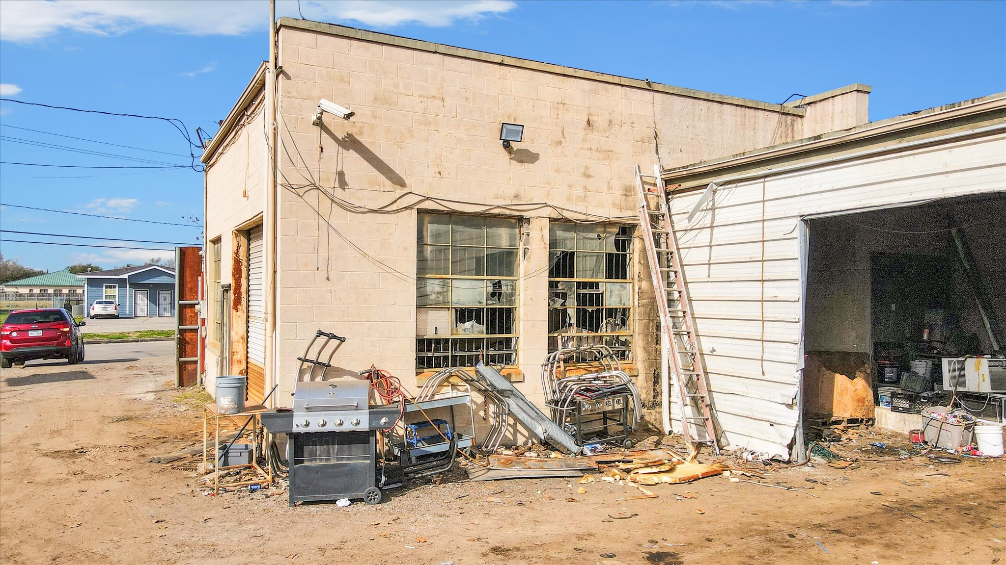 10202 Fulton Street Houston, TX 77076 - Photo 24 of 29 a view of a house with snow on the wall