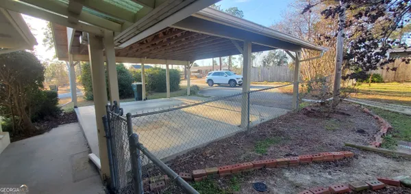 a view of a bathroom from a hallway