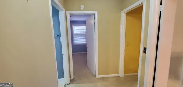 a kitchen with stainless steel appliances a refrigerator and a stove