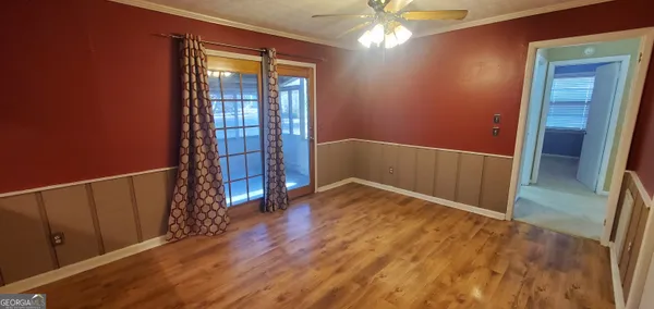 a kitchen with stainless steel appliances granite countertop a refrigerator and a stove