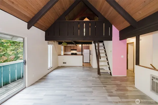 a view of a kitchen with a sink and dishwasher