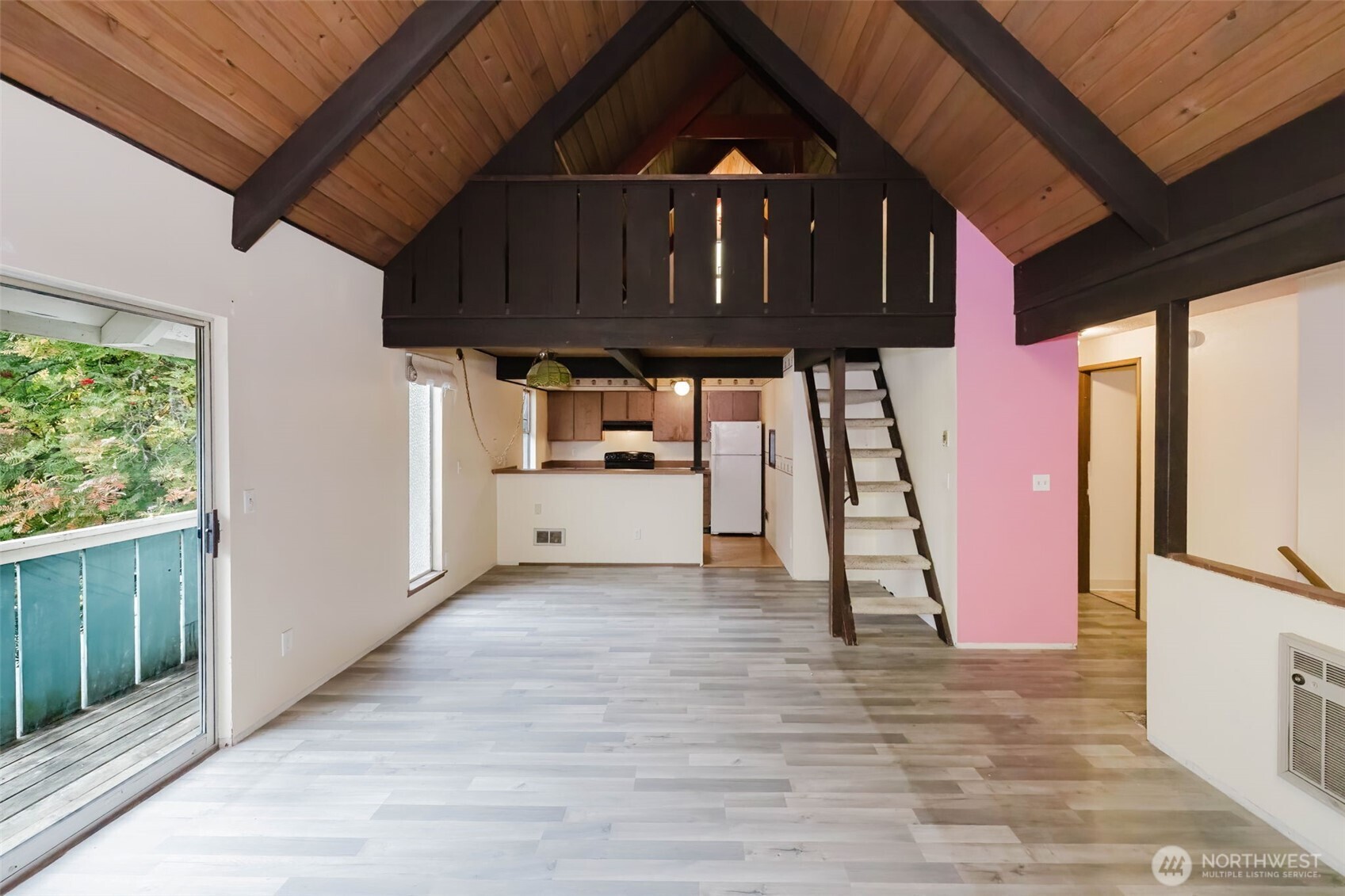 4311 67th Avenue West, Unit B Tacoma, WA 98466 - Photo 12 of 39 a view of a hallway with wooden floor and entryway
