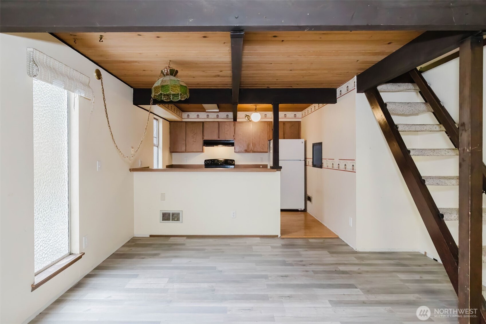 4311 67th Avenue West, Unit B Tacoma, WA 98466 - Photo 14 of 39 a view of a kitchen with a sink and dishwasher