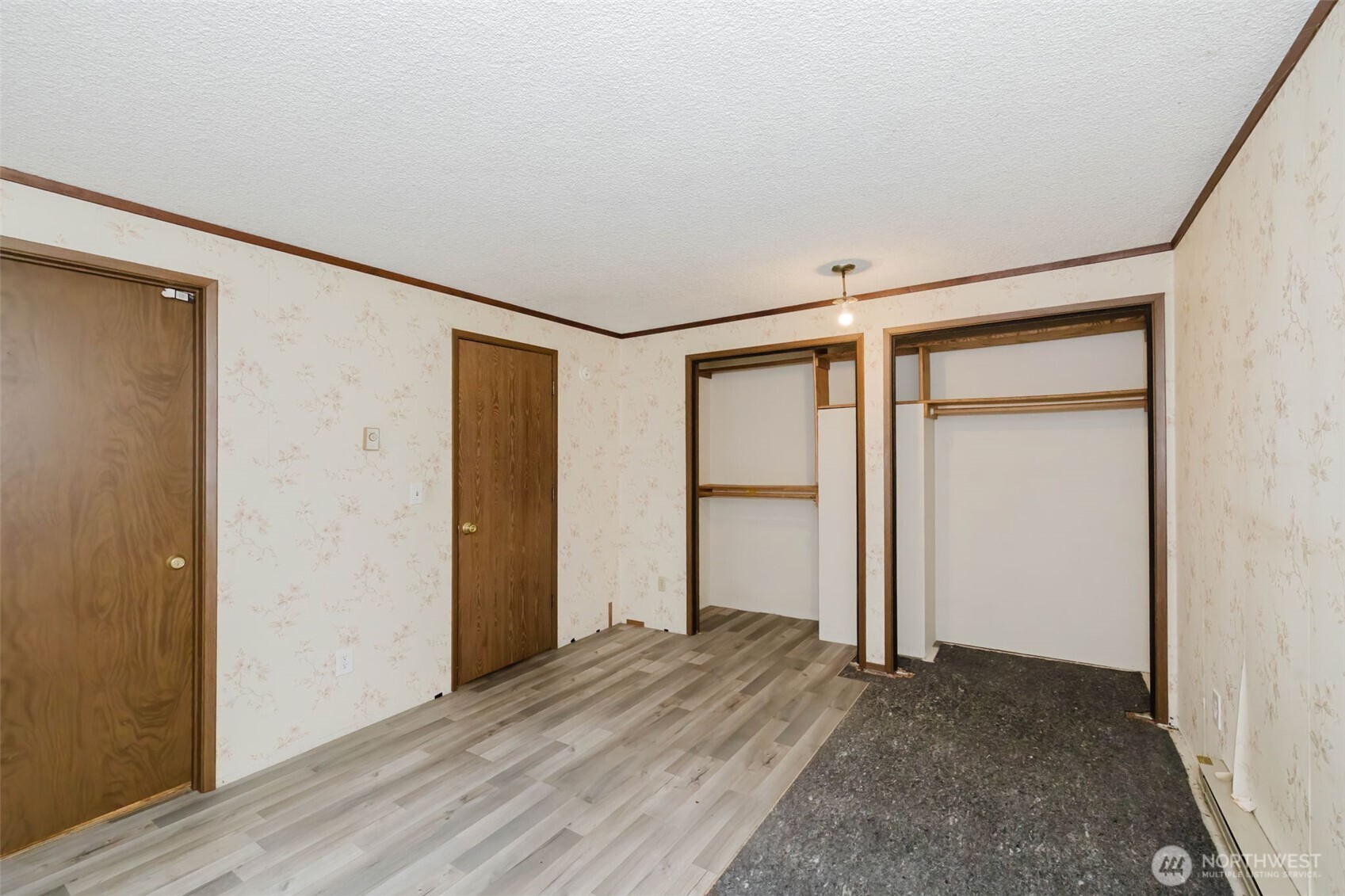 4311 67th Avenue West, Unit B Tacoma, WA 98466 - Photo 21 of 39 an empty room with closet