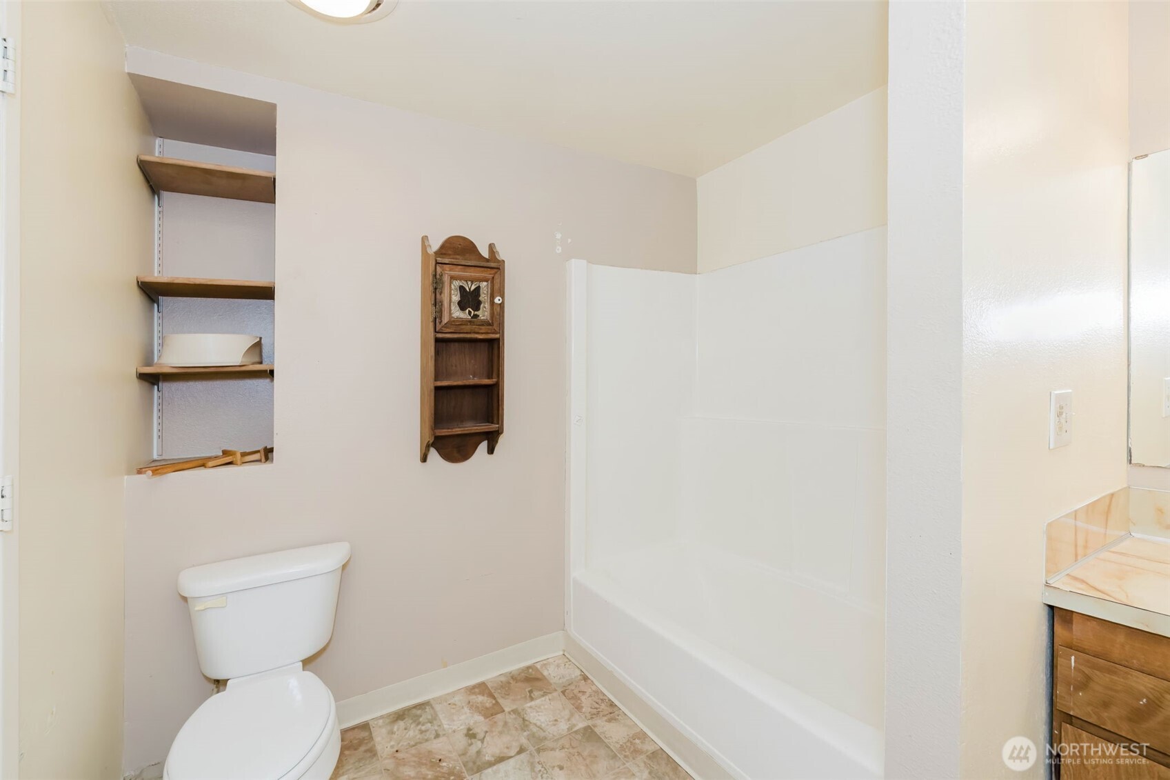 4311 67th Avenue West, Unit B Tacoma, WA 98466 - Photo 24 of 39 a bathroom with a toilet and a sink