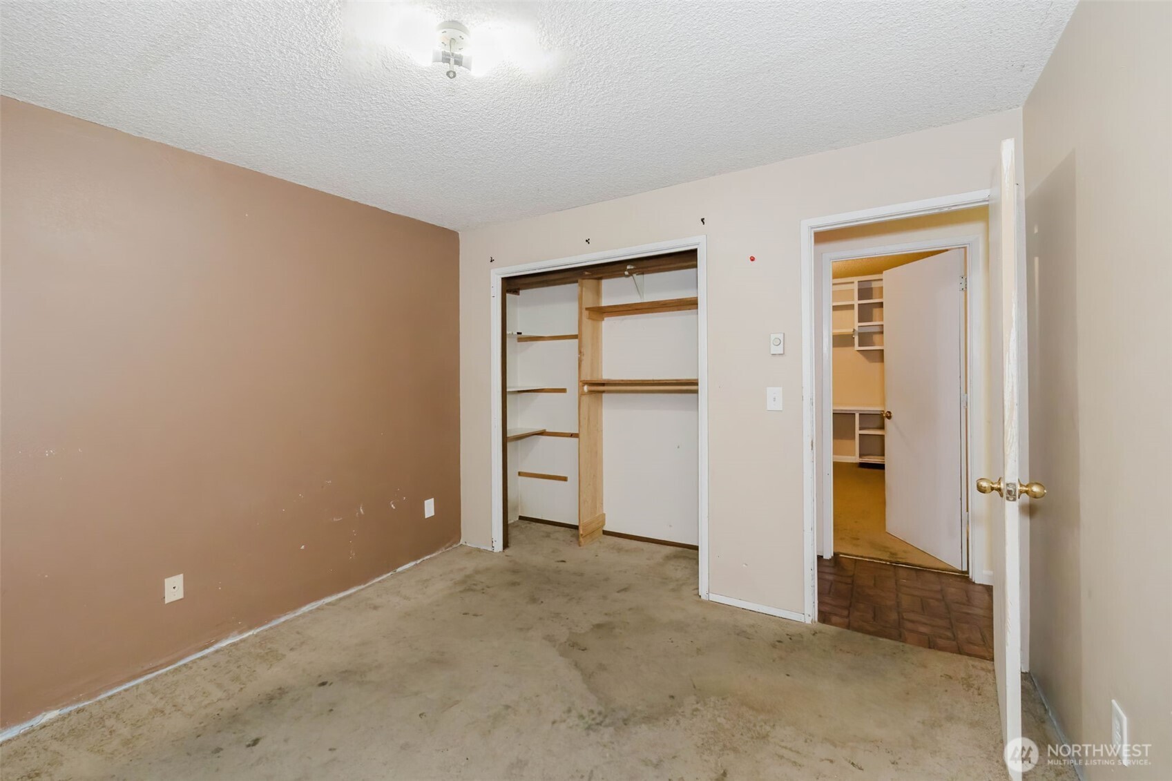 4311 67th Avenue West, Unit B Tacoma, WA 98466 - Photo 31 of 39 an empty room with closet and closet