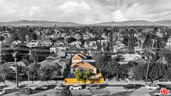 an aerial view of multiple house