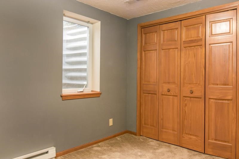 10815 Chicory Ridge Way Roscoe, IL 61073 - Photo 22 of 25 an empty room with windows