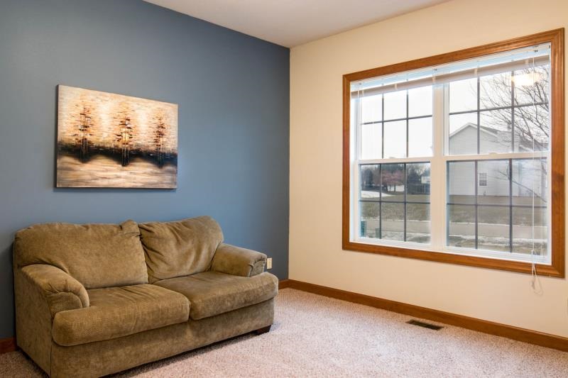 10815 Chicory Ridge Way Roscoe, IL 61073 - Photo 5 of 25 a living room with furniture and a window
