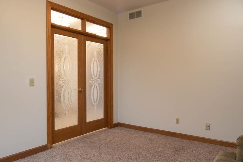 10815 Chicory Ridge Way Roscoe, IL 61073 - Photo 6 of 25 an empty room with windows