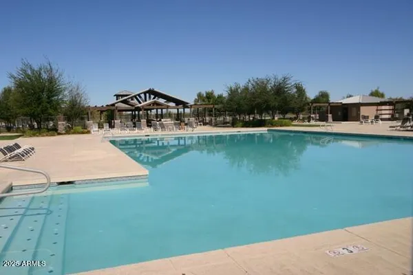 a view of a lake with a yard