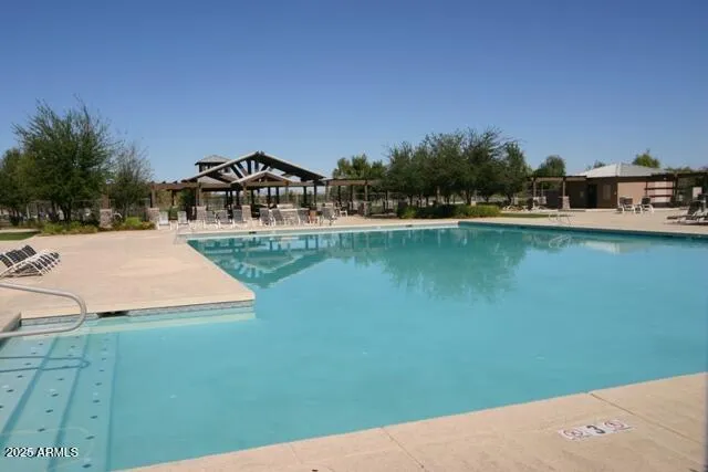 a view of a lake with a yard