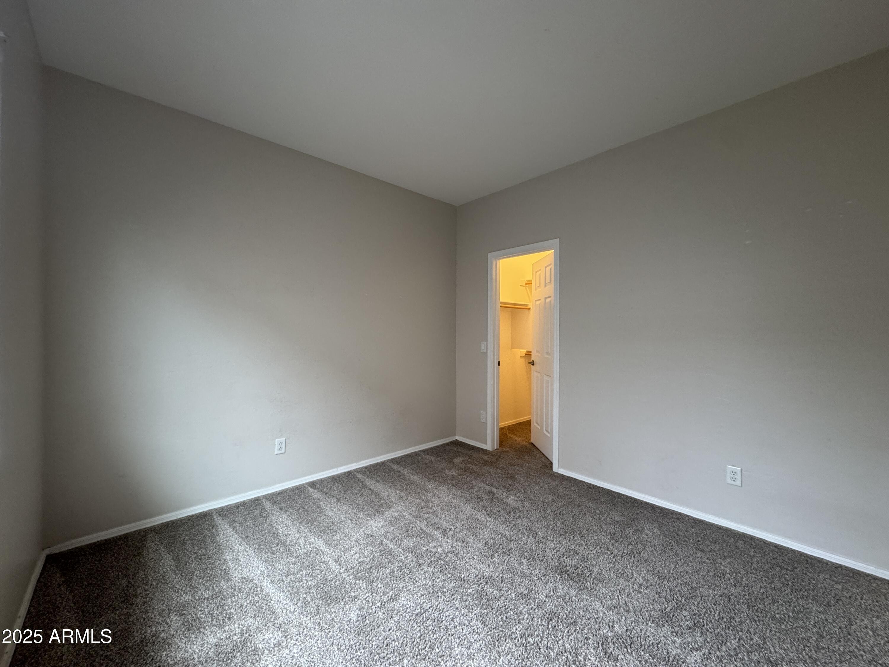 4554 East Sundance Avenue Gilbert, AZ 85297 - Photo 9 of 21 a view of an empty room and a window