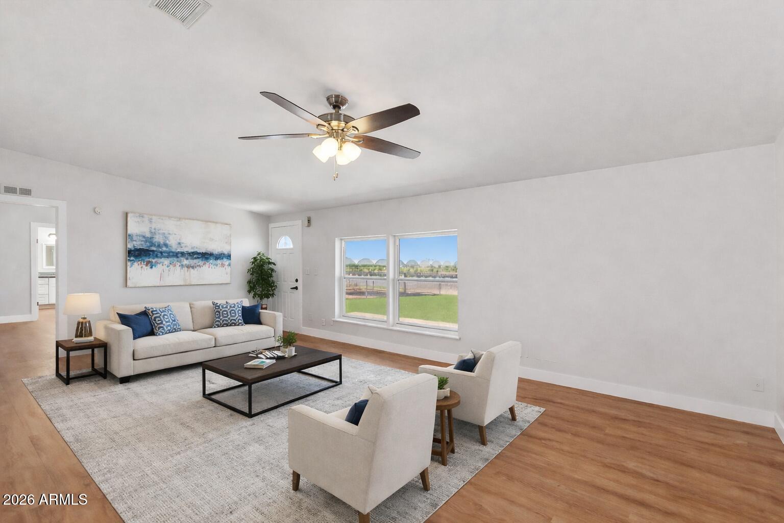 23317 South 180th Street Gilbert, AZ 85298 - Photo 20 of 36 a living room with furniture and a window