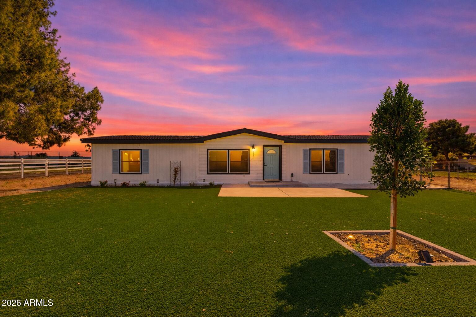 23317 South 180th Street Gilbert, AZ 85298 - Photo 3 of 36 a front view of a house with a yard