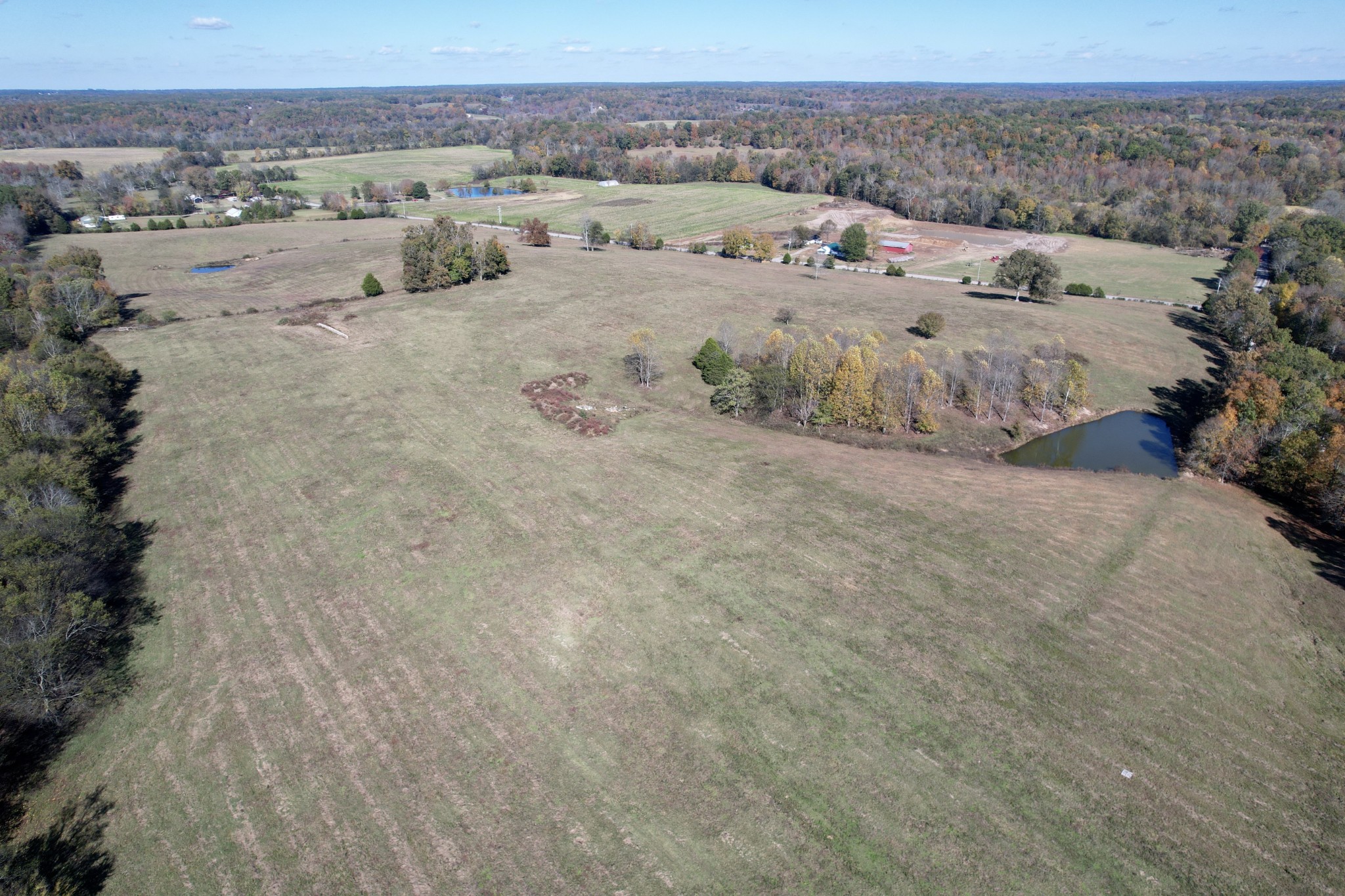 0 Henryville Road Summertown, TN 38483 - Photo 15 of 25 a view of a dry yard with mountains in the background