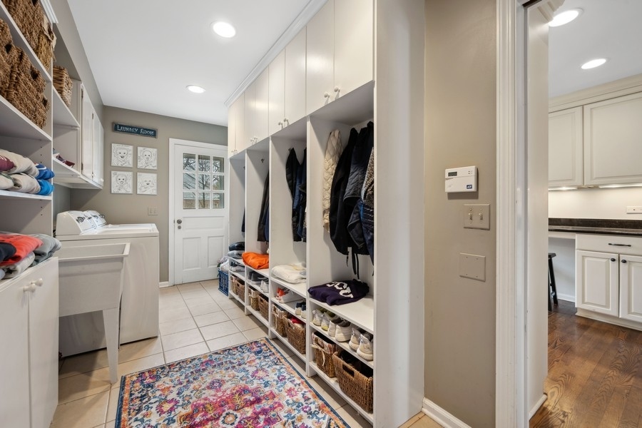 34 Longmeadow Road Winnetka, IL 60093 - Photo 12 of 35 a room with furniture and a flat screen tv