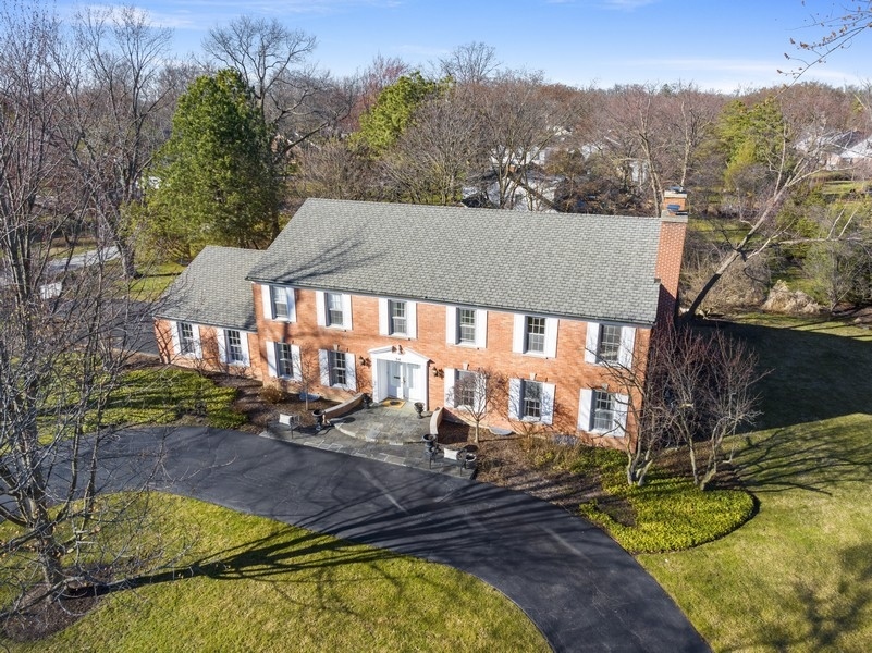 34 Longmeadow Road Winnetka, IL 60093 - Photo 33 of 35 an aerial view of a house with swimming pool and a yard