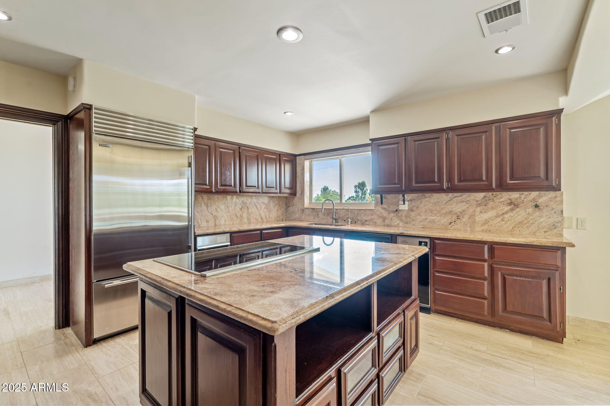5310 East Camelback Road Phoenix, AZ 85018 - Photo 15 of 50 a kitchen with granite countertop a sink and cabinets