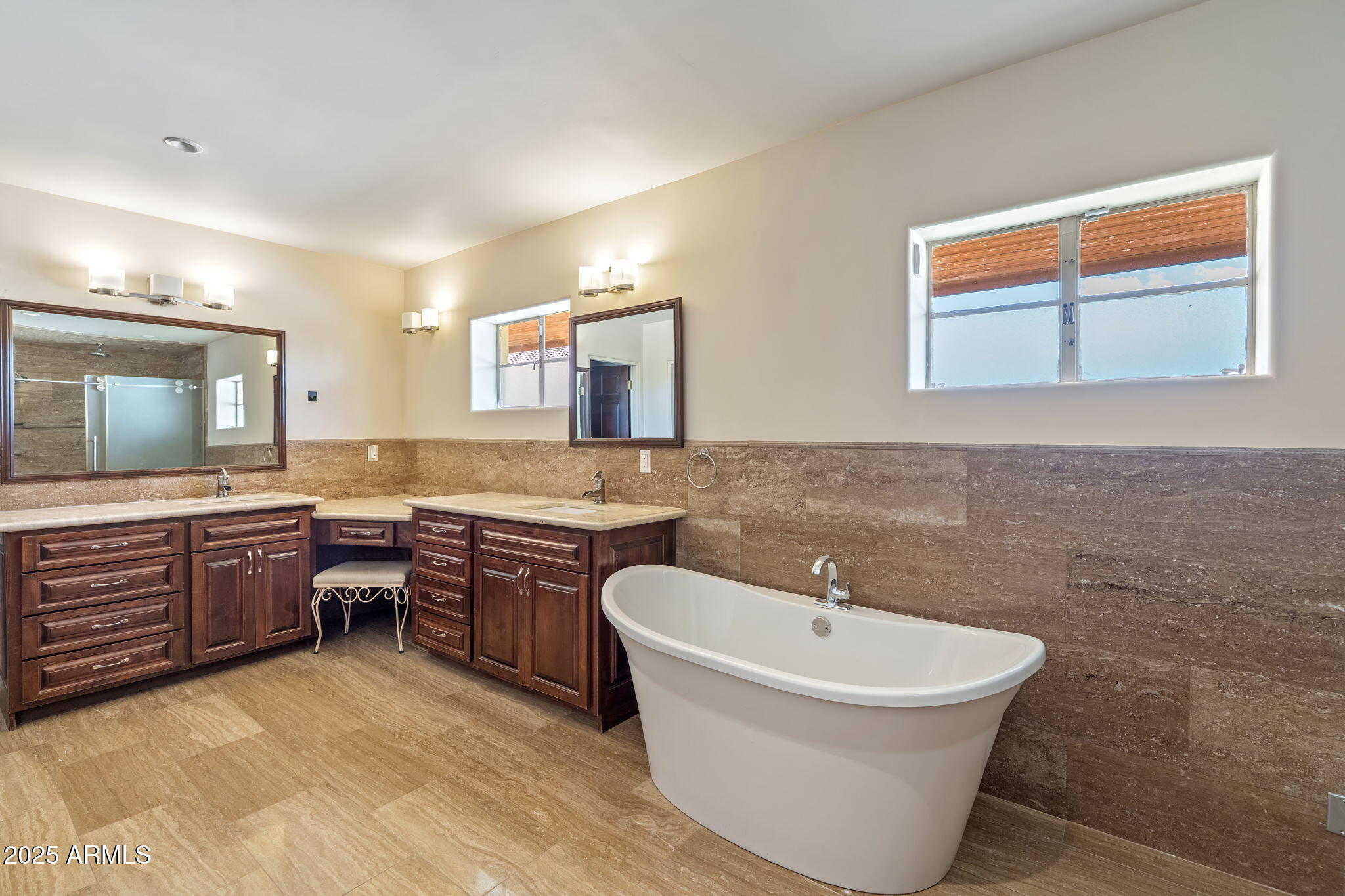 5310 East Camelback Road Phoenix, AZ 85018 - Photo 24 of 50 a spacious bathroom with a tub sink and mirror