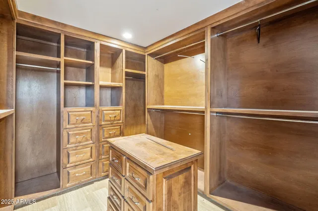 a kitchen with a refrigerator and a window