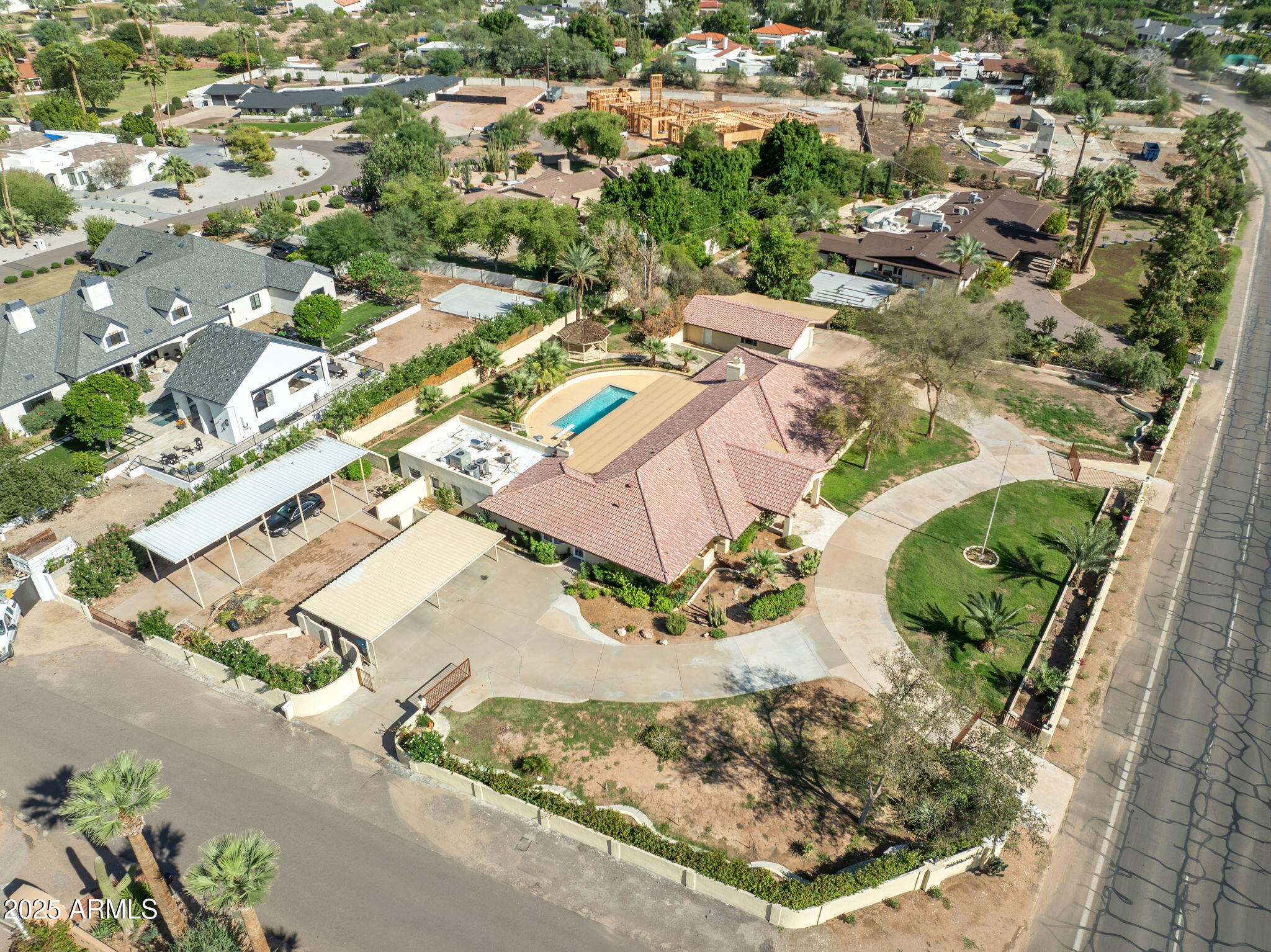 5310 East Camelback Road Phoenix, AZ 85018 - Photo 47 of 50 an aerial view of residential houses with outdoor space