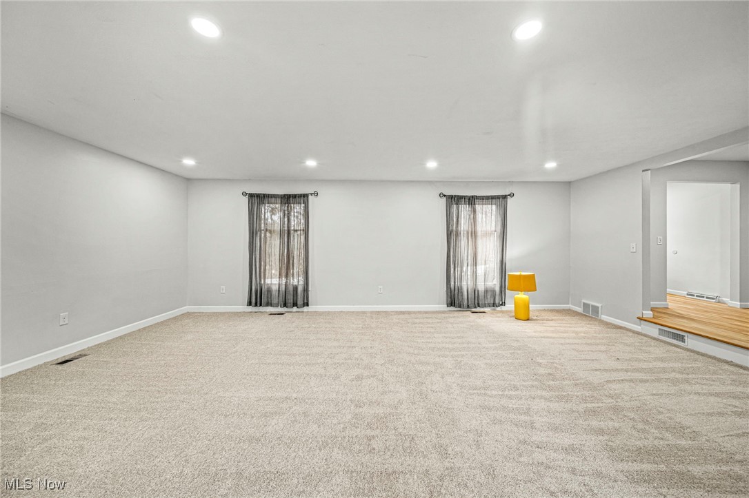 91 Paradise Road Painesville, OH 44077 - Photo 15 of 39 Carpeted spare room with recessed lighting