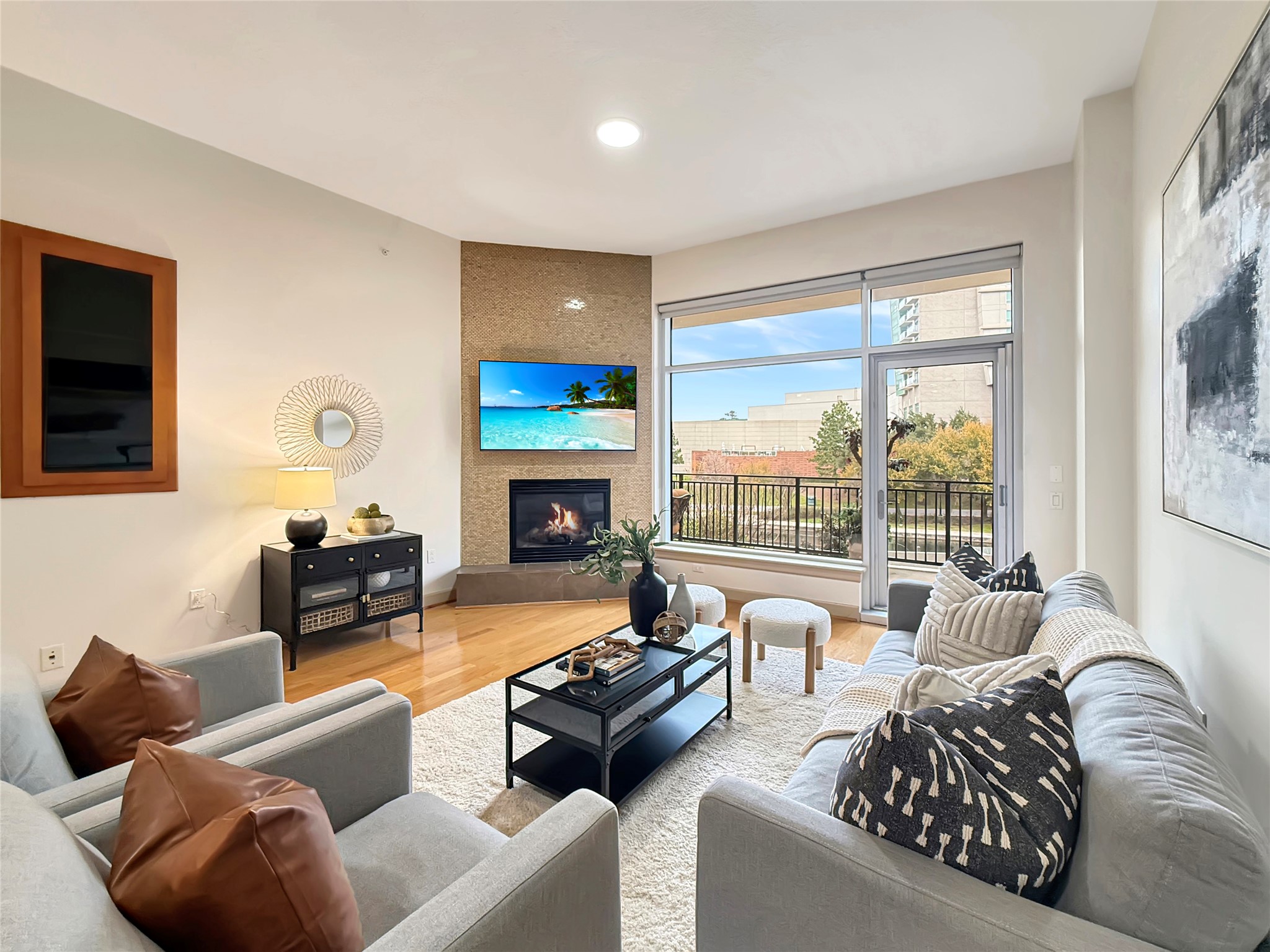 3 Waterway Court, Unit 2B Spring, TX 77380 - Photo 46 of 46 a living room with furniture and a fireplace