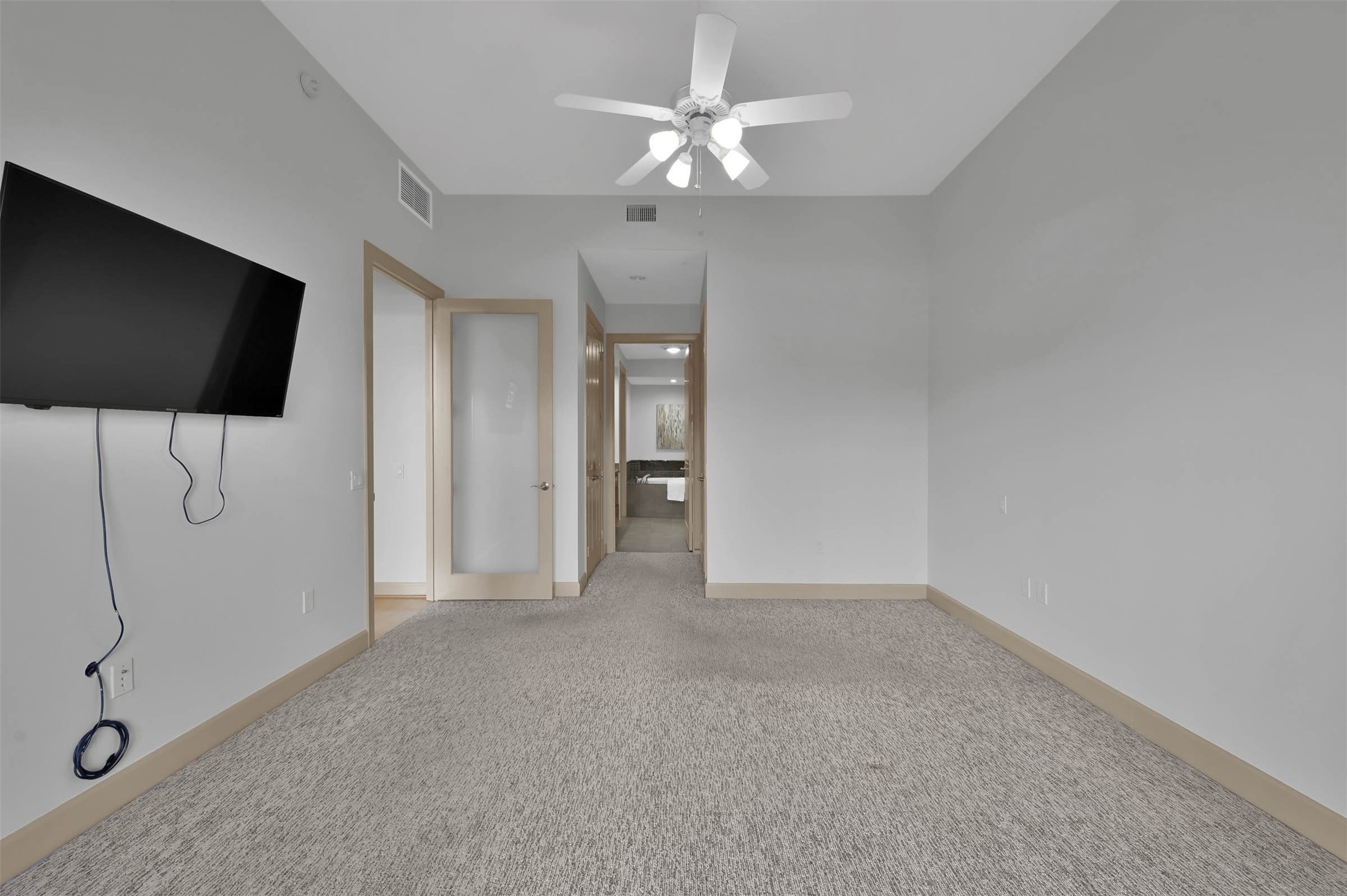 3 Waterway Court, Unit 2B Spring, TX 77380 - Photo 18 of 46 wooden floor in an empty room