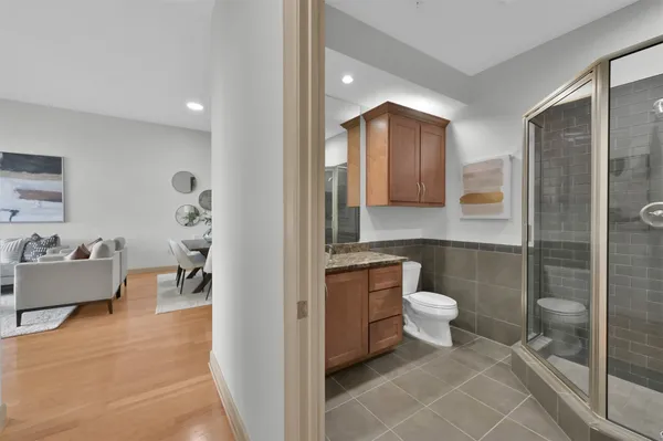 a view of balcony with furniture and city view