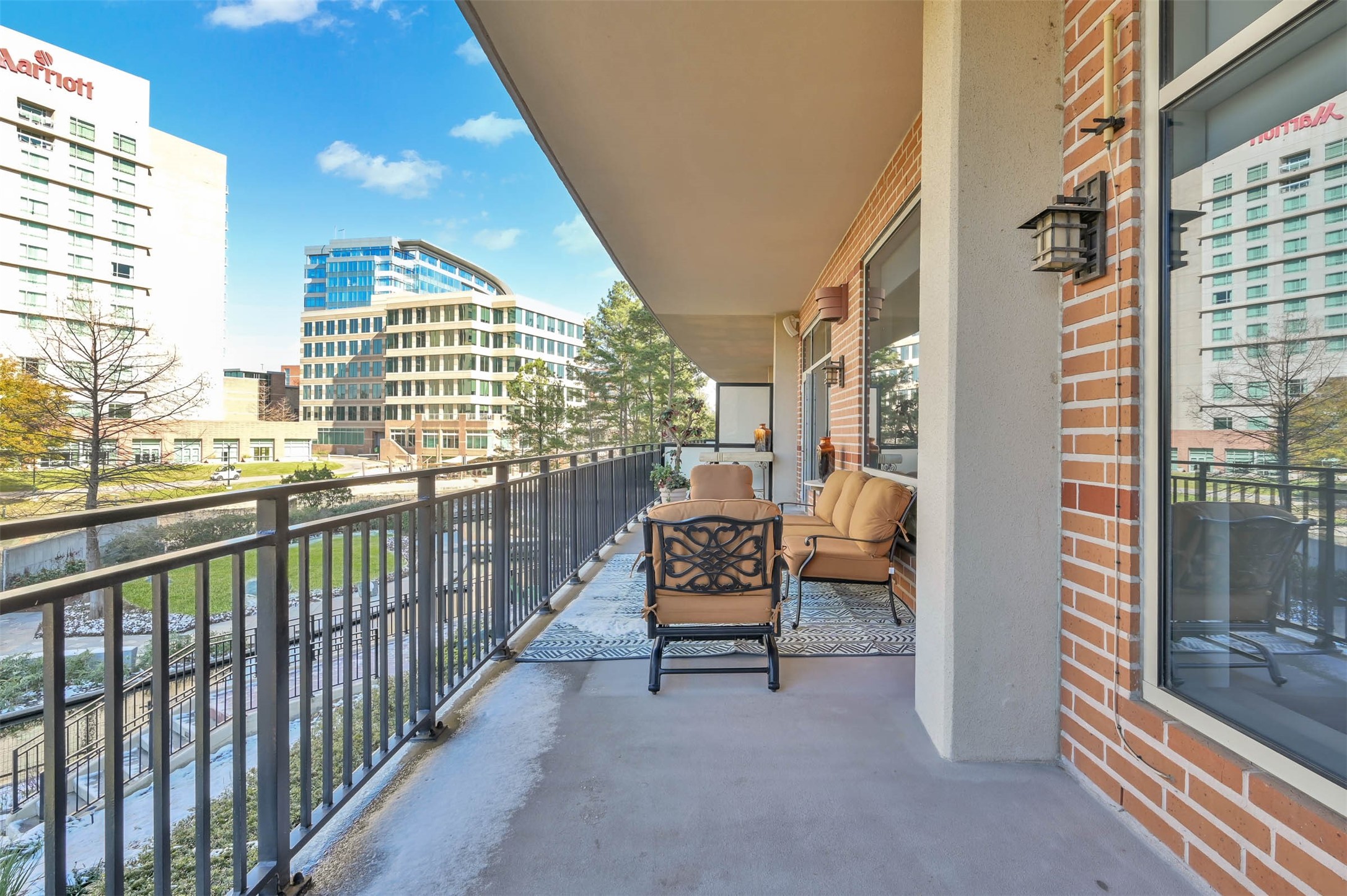 3 Waterway Court, Unit 2B Spring, TX 77380 - Photo 32 of 46 a view of a balcony with chairs