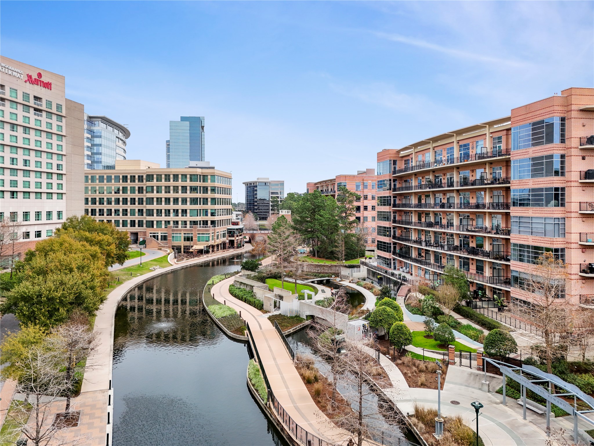 3 Waterway Court, Unit 2B Spring, TX 77380 - Photo 42 of 46 Manicured green space to the rear with secured access to the Waterway, walking/jogging trails, restaurants and more!
