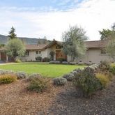 a view of house with outdoor space