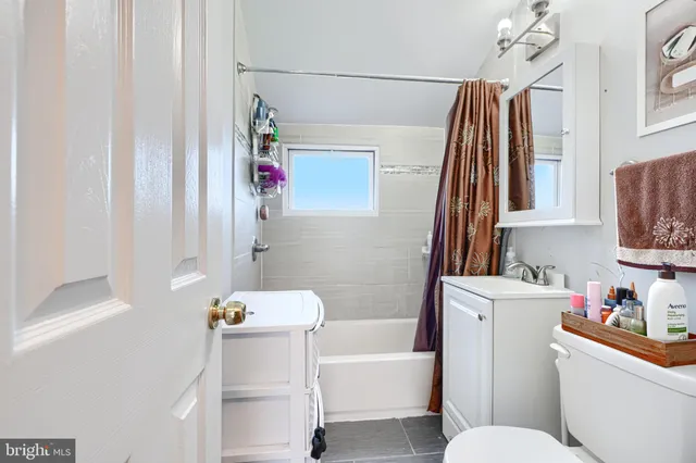 a room that has a couch and a chair in it