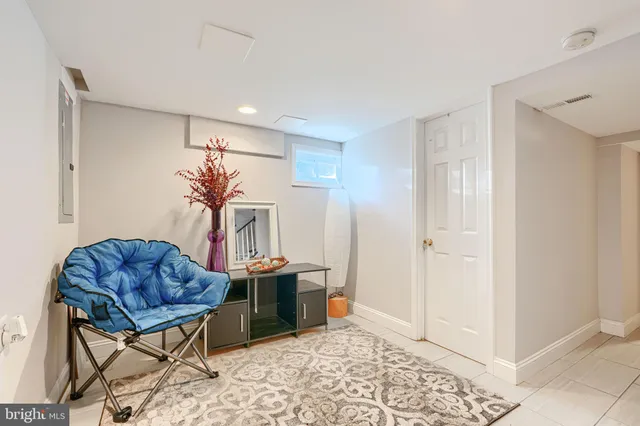 a workspace with furniture and window