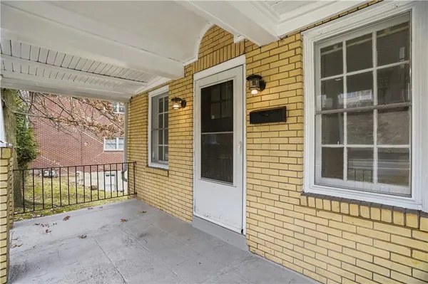 a front view of a house with a window