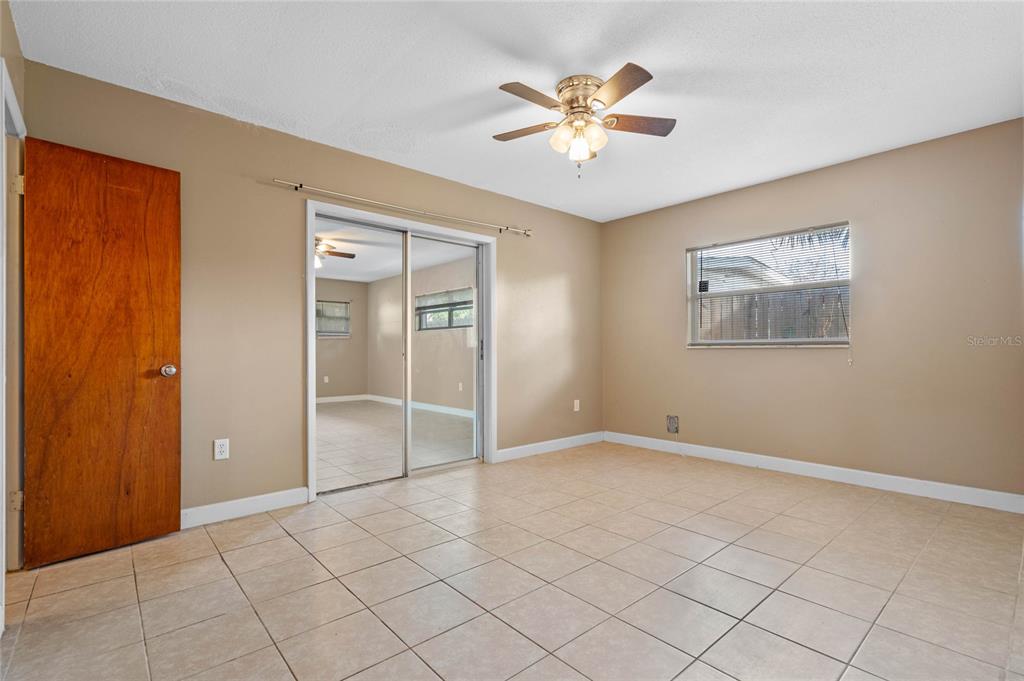 1033 Shore Acres Road Mount Dora, FL 32757 - Photo 20 of 48 Master Bedroom Den/office with slider leading to bedroom