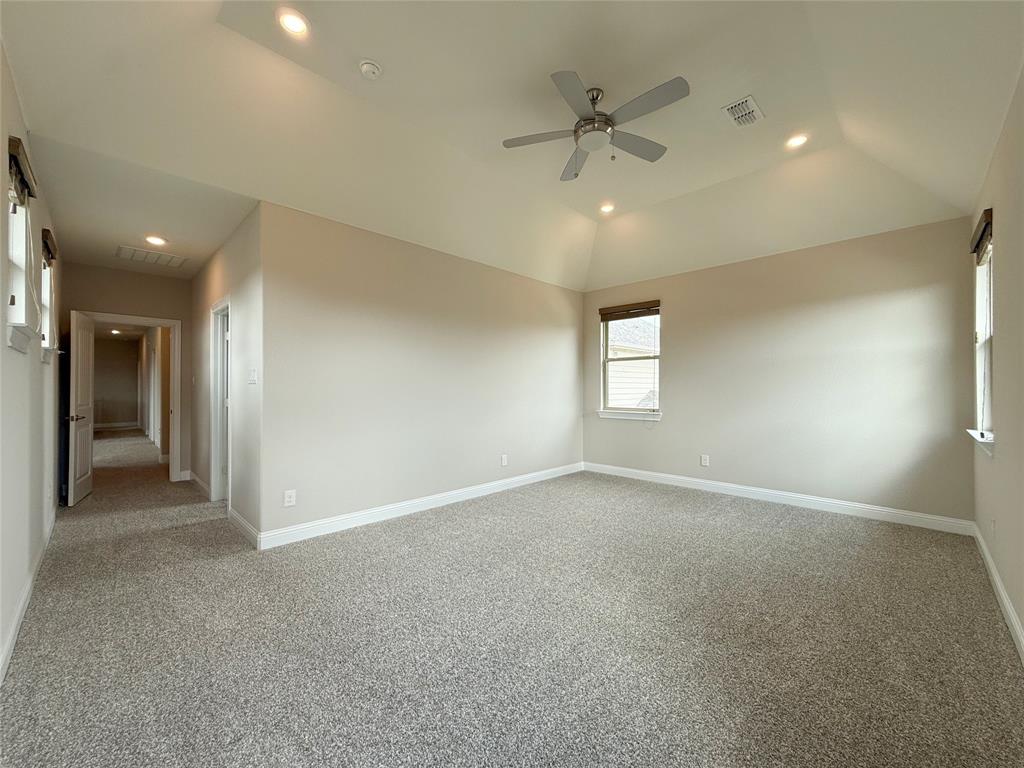 9829 Sharps Road Frisco, TX 75035 - Photo 18 of 40 Spare room with recessed lighting, light carpet, and ceiling fan