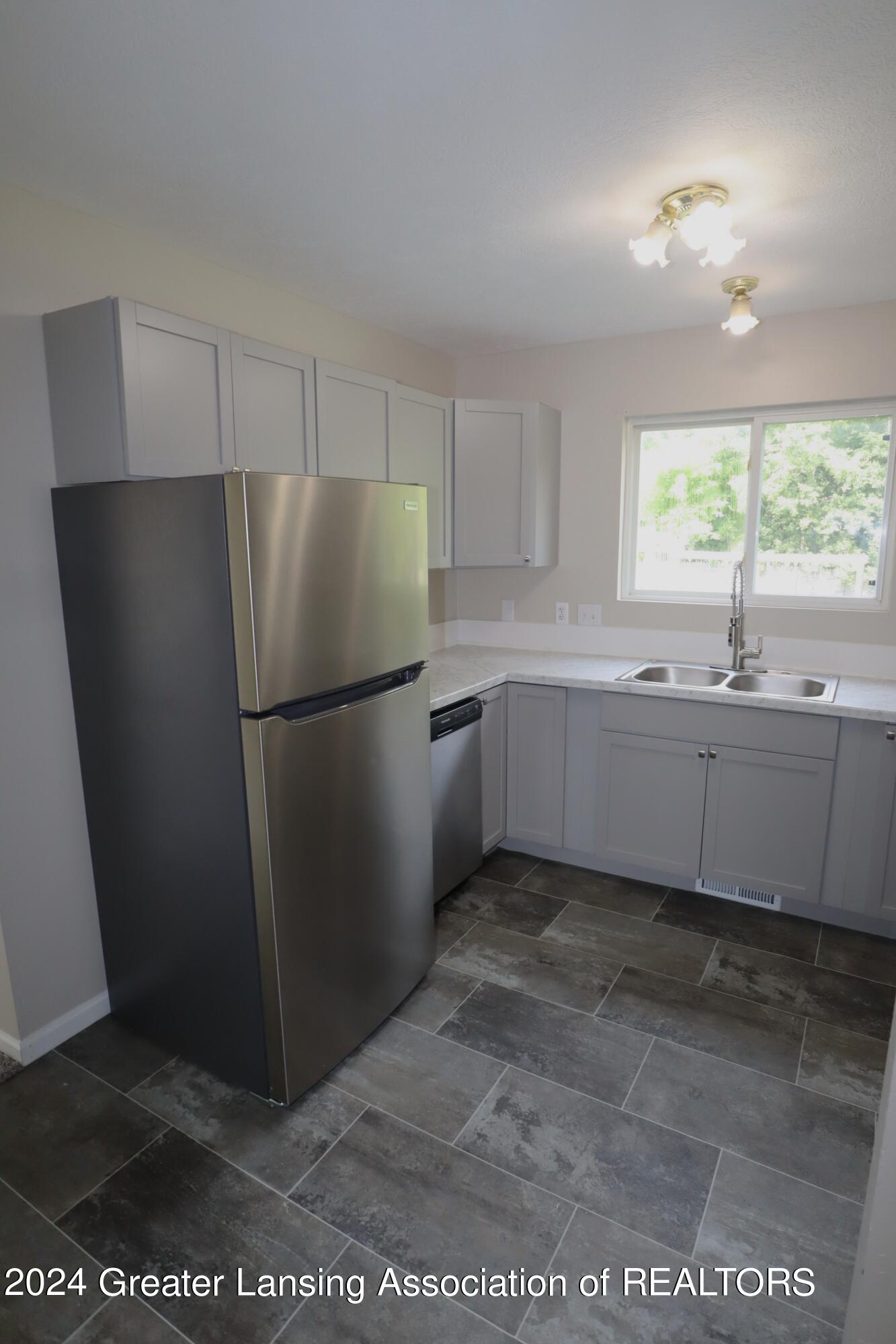 5838 Wise Road Lansing, MI 48911 - Photo 10 of 53 IMG_2952