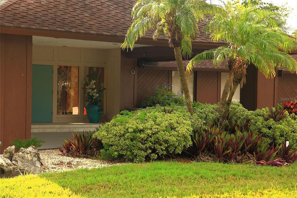 4572 Red Maple, Unit 901 Bradenton, FL 34210 - Photo 20 of 30 a view of a backyard of the house
