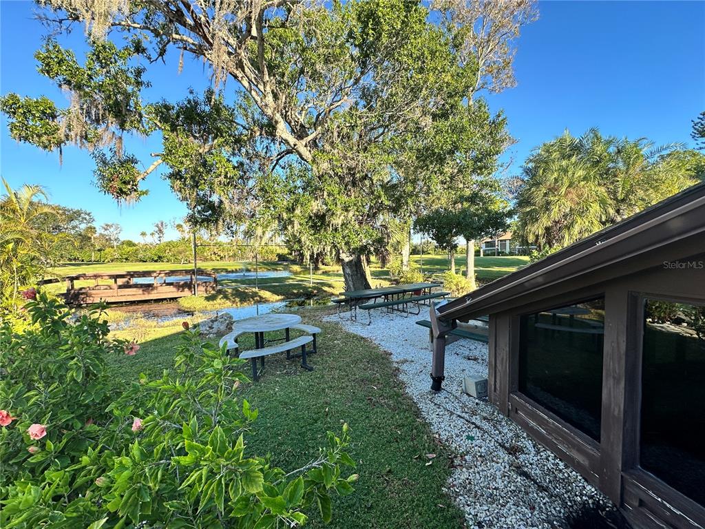 4572 Red Maple, Unit 901 Bradenton, FL 34210 - Photo 29 of 30 a view of a lake with outdoor space