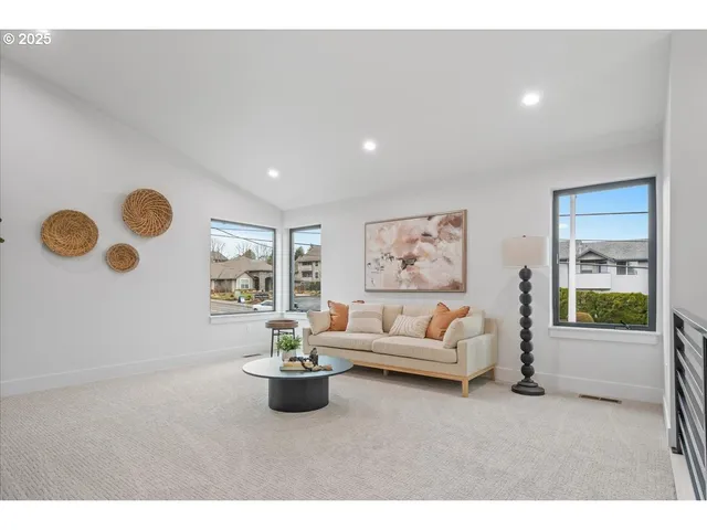 a living room with furniture and window
